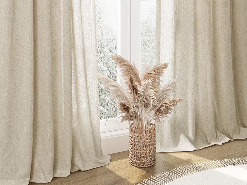 Unlined linen falling to the floor at a window — fine in daylight, but a lining is the question once it is dark outside